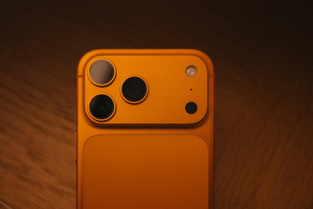 Close-up of orange smartphone camera module