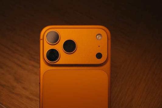 Close-up of orange smartphone camera module
